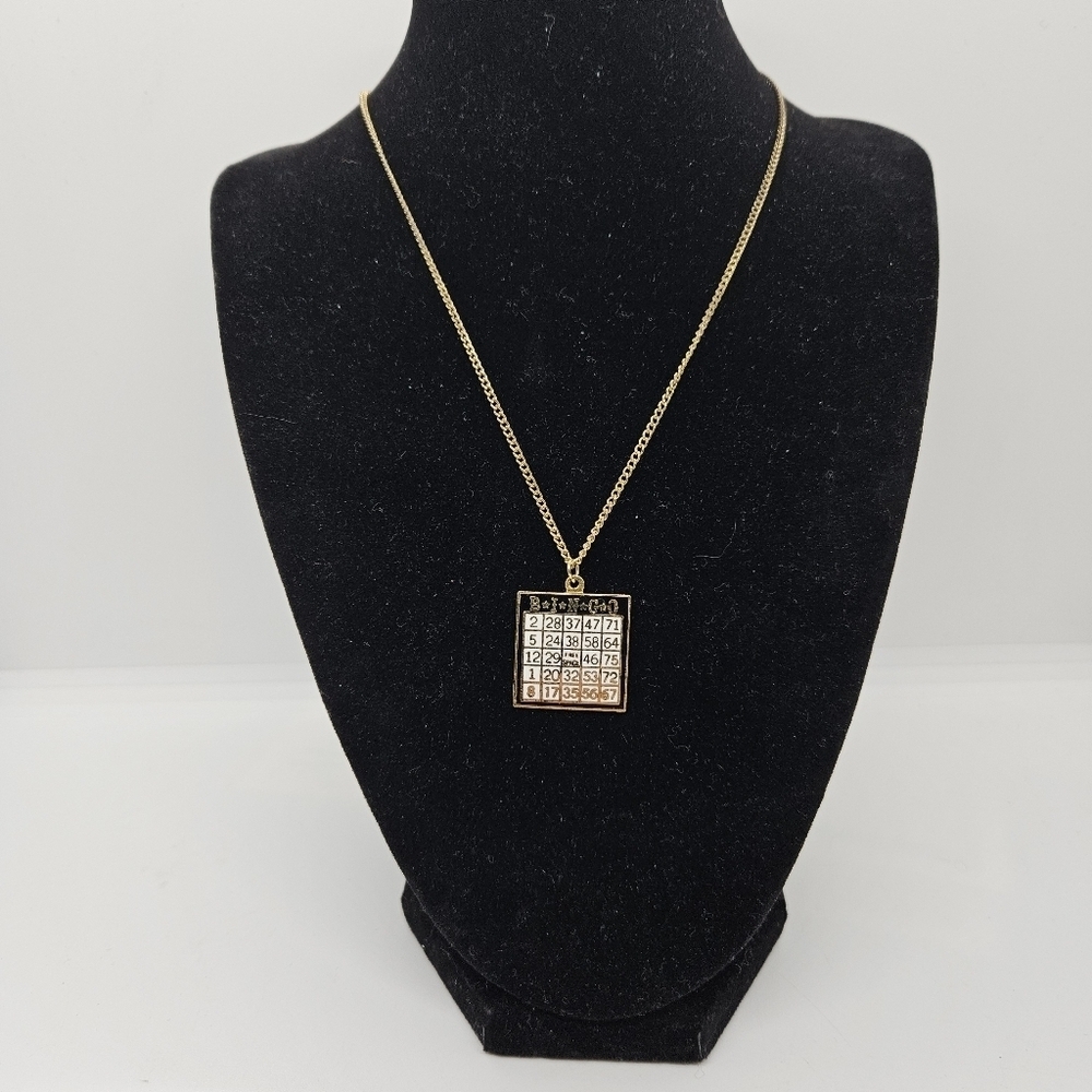 Mafco gold tone chain necklace with bingo card pendant